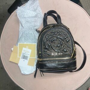Michael Kors Rhea Black Leather Mini Backpack with Gold Stud Floral Detail